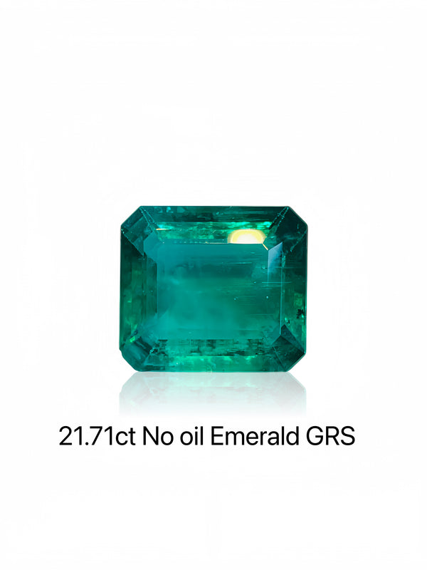 A 21.71ct no oil emerald with GRS certification, displayed on a white background.