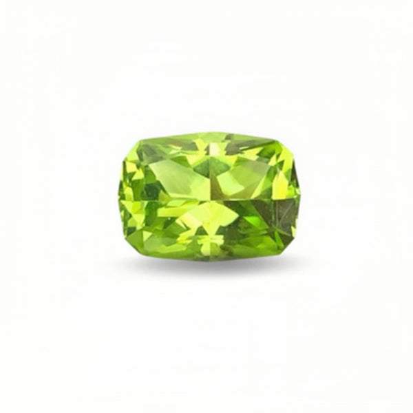 Green Peridot gemstone on a white background 3 Carats