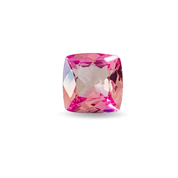 Pink Zoisite gemstone on a white background