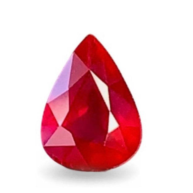 Teardrop-shaped ruby with '1.5CT RUBY UNHEATED PIGEON BLOOD MOZAMBIQUA' text on a white background